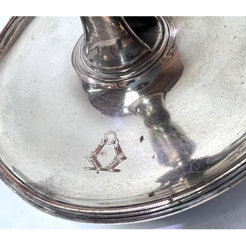 626 - A silver plated Chamber candlestick with snuffer bell mark to base, with incised coat of arms type d... 