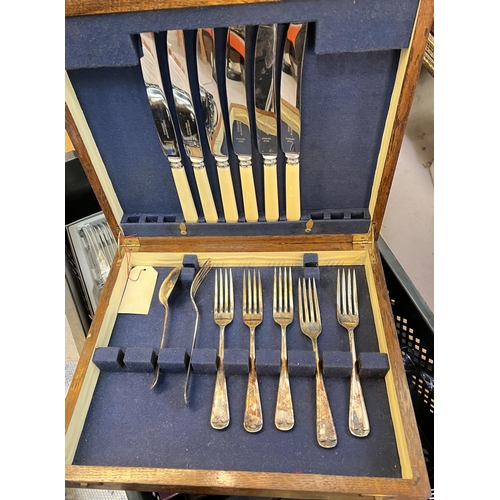 658 - A cutlery canteen; a selection of stainless steel/silver plated cutlery, boxed and loose; etc.