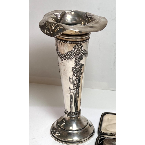 725 - A hallmarked silver christening spoon and fork, boxed; a posy vase (a.f.); a napkin ring; 2 hallmark... 