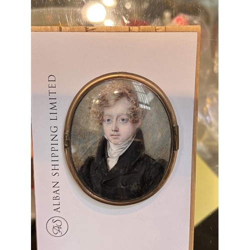 758A - A 19th century miniature portrait of a young man in high colared coat and shirt with signtaure ofver... 