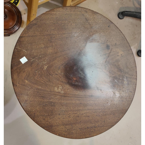 837A - A Georgian mahogany circular occasional table with pedestal column and three splay feet 