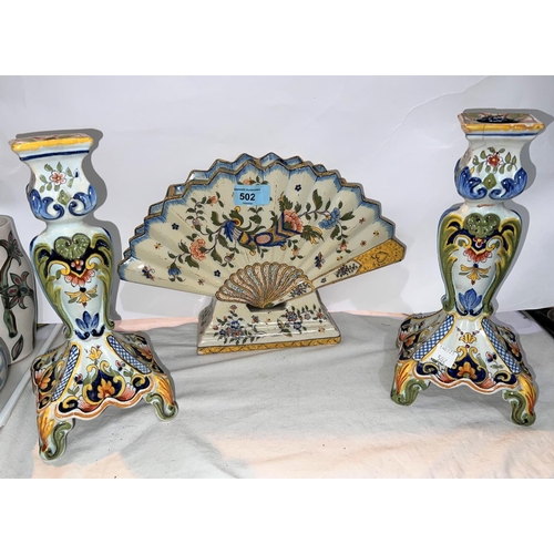 587 - A pair of Italian majolica candle sticks and a similar fan shaped vase (a.f)