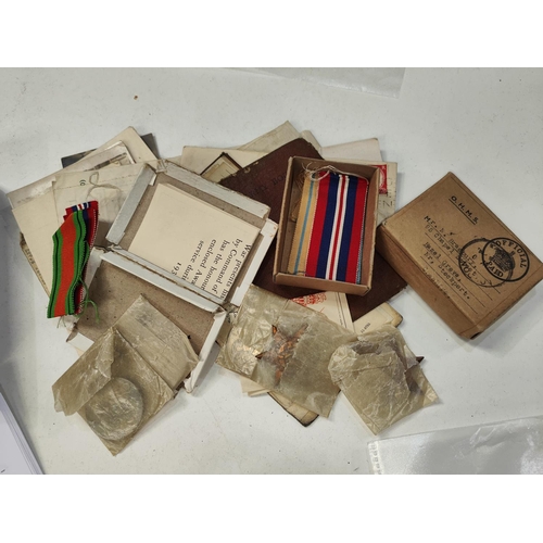 138 - A WWII pair of medals issued to 14237733 A.BRADBURY R.A with Pay Book etc and a group of 3 medals to... 