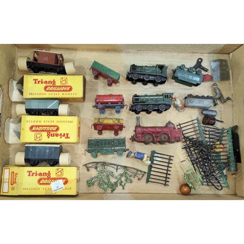 231 - A selection of Dinky Meccano TT gauge locomotives, carriages, three boxed Tri-ang TT gauge trucks ot... 