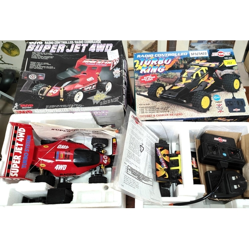 267 - A Taiyo Radio controlled Super Jet 4WD car (box a.f) and a Hitari Radio controlled Turbo King racing... 