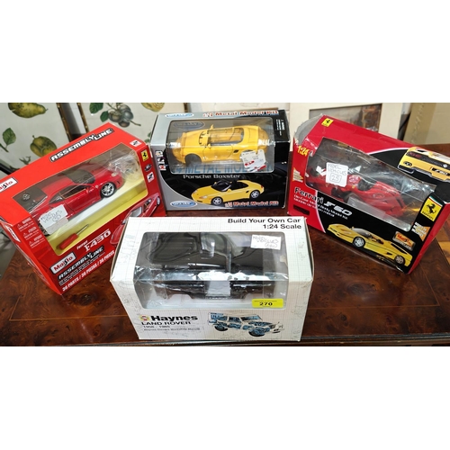 270 - A Haynes Land Rover Build your own car 1:24 scale, boxed, three similar car building sets in boxes a... 