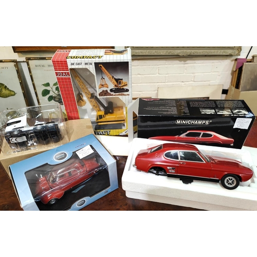 275 - A Joal Compact Die cast - metal model boxed of a 'Digging Crane', A Mini Champs Ford Capri (a.f), tw... 