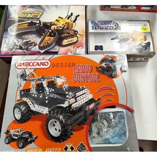 296 - A boxed Meccano design Radio control set 8700 for construction, a boxed Remote control robot ATR 3in... 