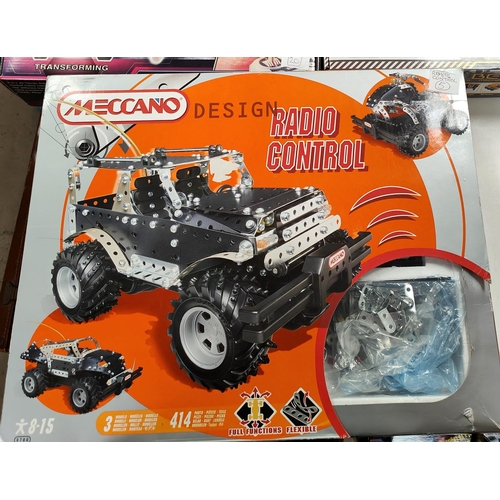 296 - A boxed Meccano design Radio control set 8700 for construction, a boxed Remote control robot ATR 3in... 