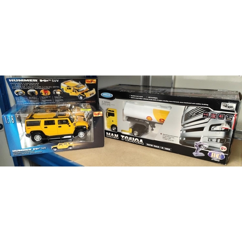 299 - A Maisto originally boxed Hummer H2 SUV 1:18 radio controlled vehicle, A Welly Man TG510A die-cast 1... 