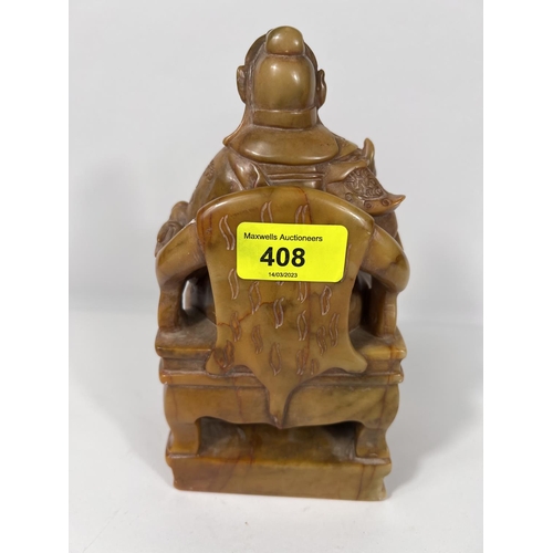 408 - A carved brown soapstone figure of a seated Chines sage height 20cm