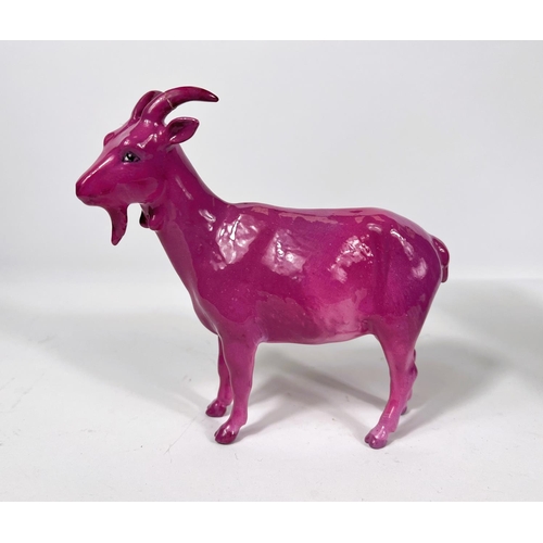 468 - A rare Beswick goat in pink colourway, with Beswick mark to base Model No. G223, (one horn restored)