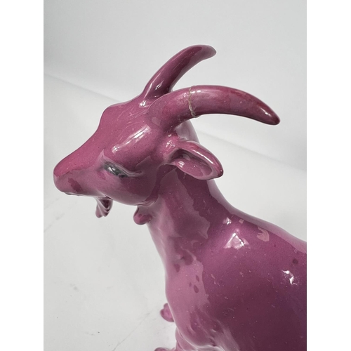 468 - A rare Beswick goat in pink colourway, with Beswick mark to base Model No. G223, (one horn restored)