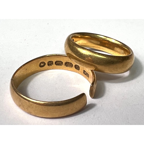 637 - Two 22 carat hallmarked gold wedding rings (1 cut), 10.1gm