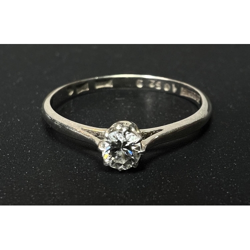 639 - A white metal ring stamped '18ct', set solitaire diamond, stone diameter 3.5mm approx, size 'M', 1.6... 