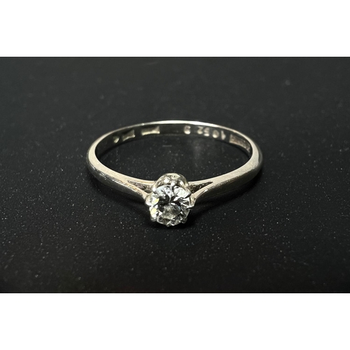 639 - A white metal ring stamped '18ct', set solitaire diamond, stone diameter 3.5mm approx, size 'M', 1.6... 