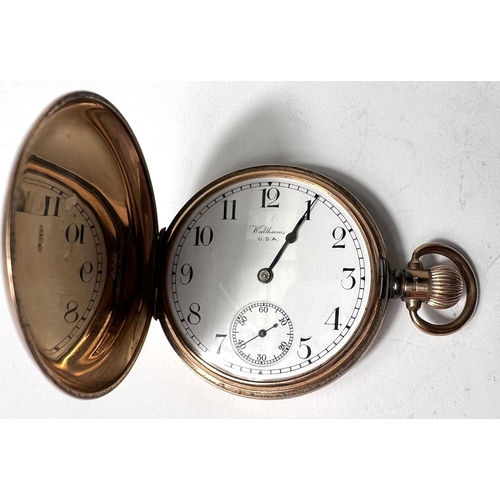 648 - A 9 carat hallmarked gold keyless hunter pocket watch by Waltham, gross weight 98gm (appears to work... 