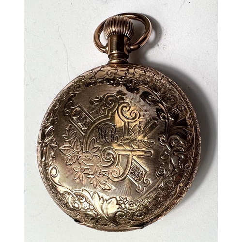 649 - A Waltham keyless hunter fob/pocket watch in gold coloured extensively chased case