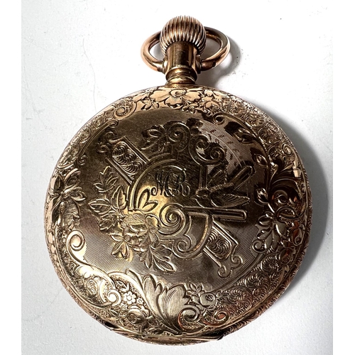 649 - A Waltham keyless hunter fob/pocket watch in gold coloured extensively chased case