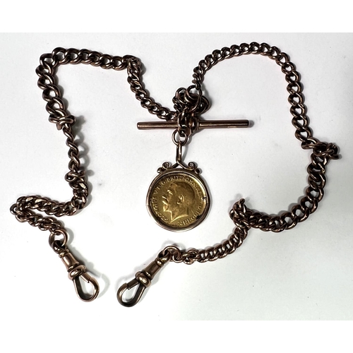 650 - A 9 carat hallmarked gold double albert with bar and 2 clips, 1914 half sovereign fob, 34gm