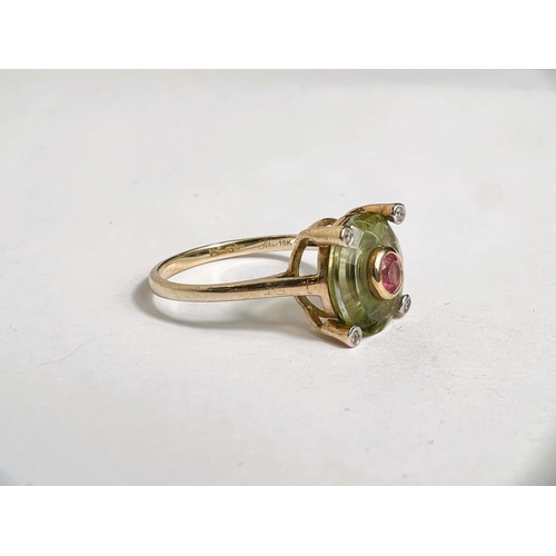 670 - A lady's 9 carat gold dress ring set fern green quartz, the centre removed and set with 4mm pink tou... 