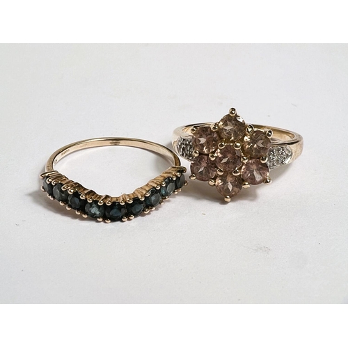 672 - A lady's 9 carat gold dress ring with 9 indicolite round cut stones in wishbone setting, size P; a 9... 