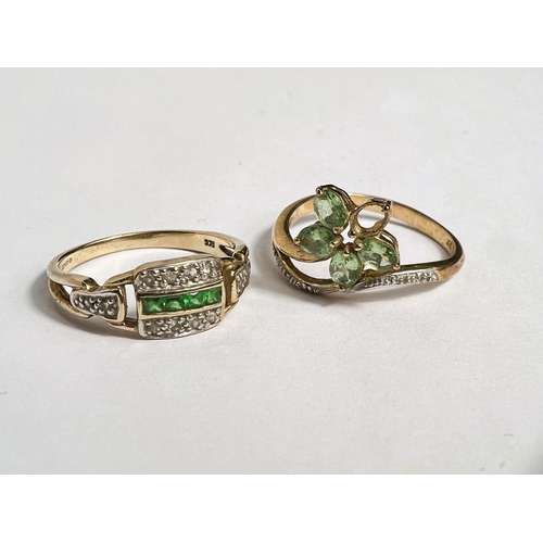 675 - A lady's 9 carat gold dress ring set 4 small tsavorite stones and 12 white sapphires, size M/N; a 9c... 