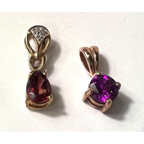 681 - Three 9K gold pendants set garnets (2 with small diamonds); a 9K pendant set round umbalite stone (8... 