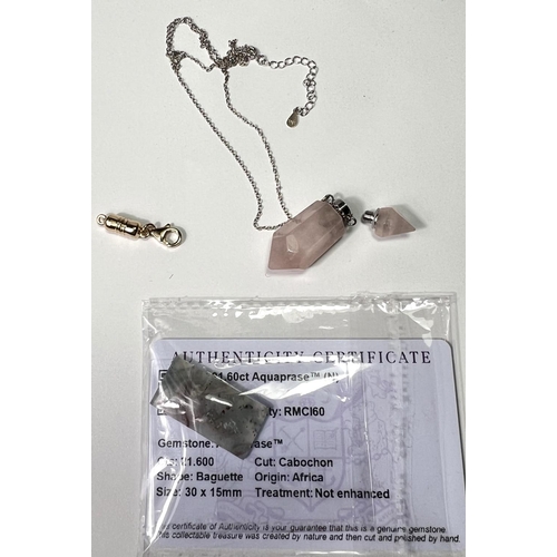 718 - A 21.6 Aquaprase rectangular stone; a pink quartz pendant perfume holder with screw on chain top; a ... 