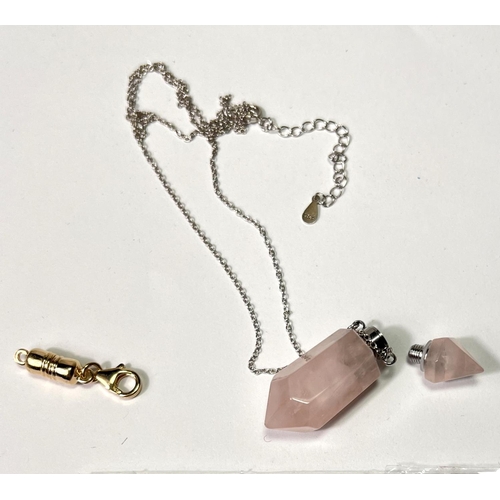 718 - A 21.6 Aquaprase rectangular stone; a pink quartz pendant perfume holder with screw on chain top; a ... 