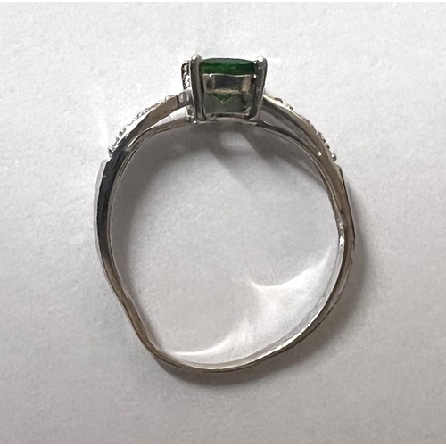 743 - A 9 carat hallmarked gold dress ring set pale green circular peridot, size N; a 9 carat hallmarked w... 