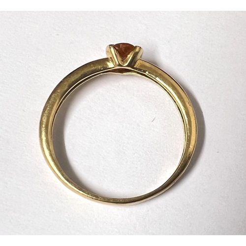 752 - An 18 carat hallmarked gold dress ring set oval citrine, size Q, weight 2.3gm; a 9 carat hallmarked ... 