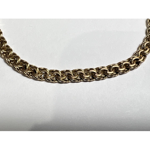 756 - A yellow metal bracelet formed from double links, stamped 333, 9 gms 