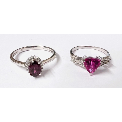 772A - Two 9ct hallmarked white gold rings set with pink stones, 1 triangular with diamond chip to each sho... 