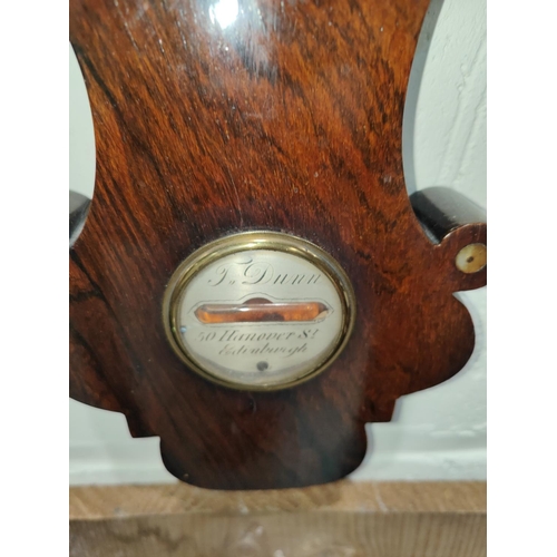 9 - An early19th century mercury column barometer with thermometer in mahogany banjo shaped case