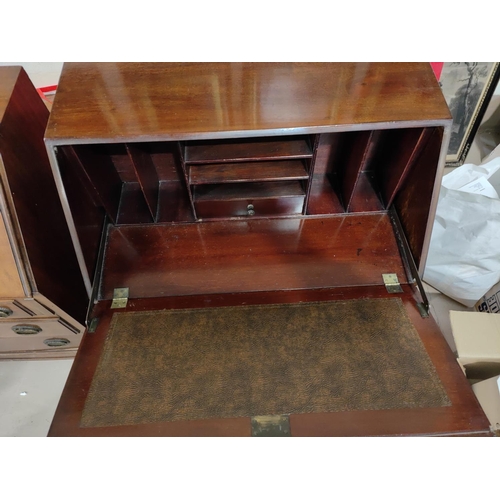 911 - A 1920's period style mahogany bureau with fall front and 3 drawers, on ball and claw feet