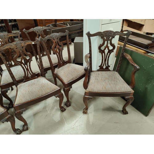 943 - A 19th century mahogany set of 8 (6 + 2) Chippendale style dining chairs, with extensive carved deco... 