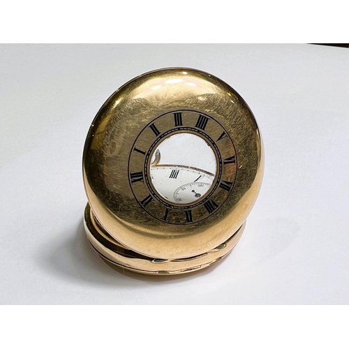 735 - A gent's half hunter keyless pocket watch in yellow metal, the front cover stamped '18c', gross weig... 