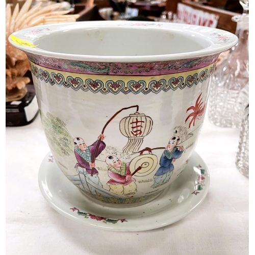 414 - A Chinese Republic period shallow bowl decorated in polychrome with children exercising, orange seal... 