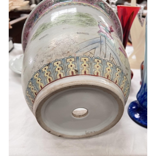 414 - A Chinese Republic period shallow bowl decorated in polychrome with children exercising, orange seal... 