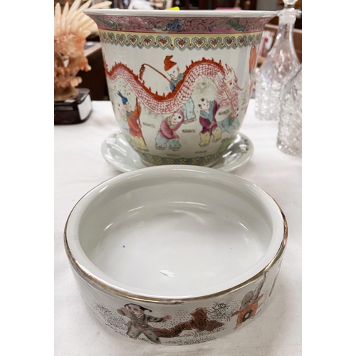 414 - A Chinese Republic period shallow bowl decorated in polychrome with children exercising, orange seal... 