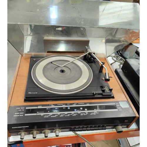 194 - A vintage Garrard record player/ radio, two Thorn speakers a Hitachi tape deck, a Panasonic Video ca... 