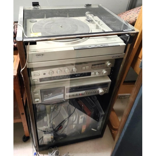 195 - A vintage Sony stacking system with record player, tape player etc and three Sony speakers 