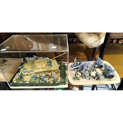 324A - A scratch built military diorama of a tank building reloaded and readied, in Perspex case, L30cm; an... 