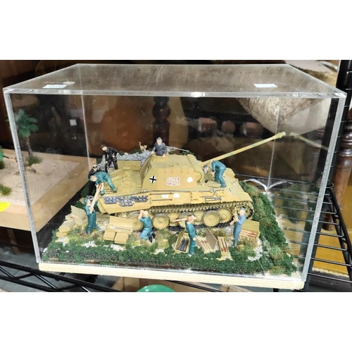 324A - A scratch built military diorama of a tank building reloaded and readied, in Perspex case, L30cm; an... 