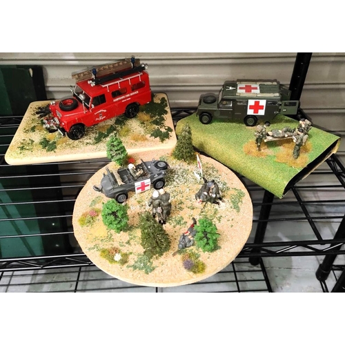 324C - Two scratch built military dioramas wounded soldiers being treated and evacuated and another of a Re... 