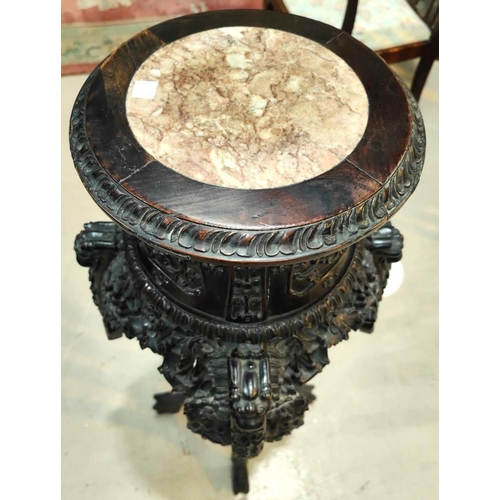 401 - A Chinese tall plant stand in carved and pierced hardwood, with inset marble top, height 97cm