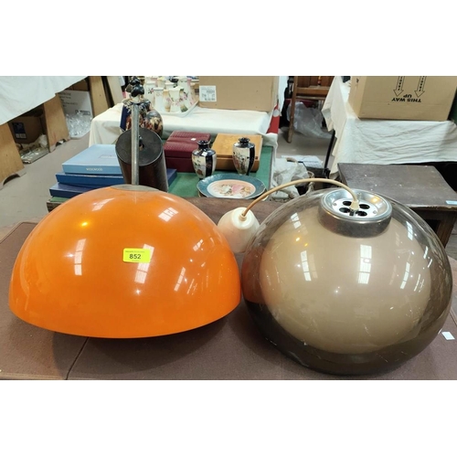 852 - A mid 20th century orange designer plastic light bowl ceiling light and another in clear brown ... 