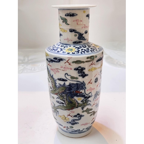 412 - A Chinese rouleau shaped vase decorated in underglaze blue and polychrome with 