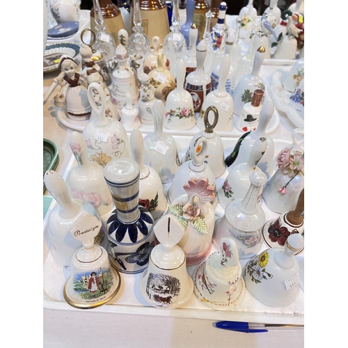 444 - A large selection of ceramic bells and other types of bells